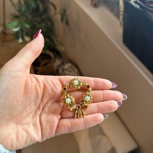 Elegant Gold and Red Floral Brooch